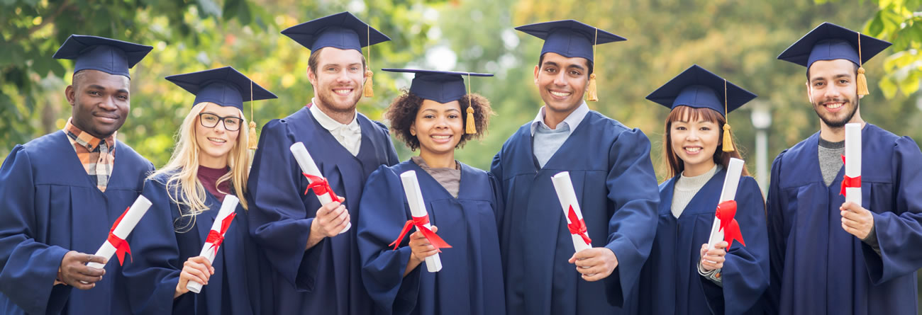 Line of graduates holding diplomas