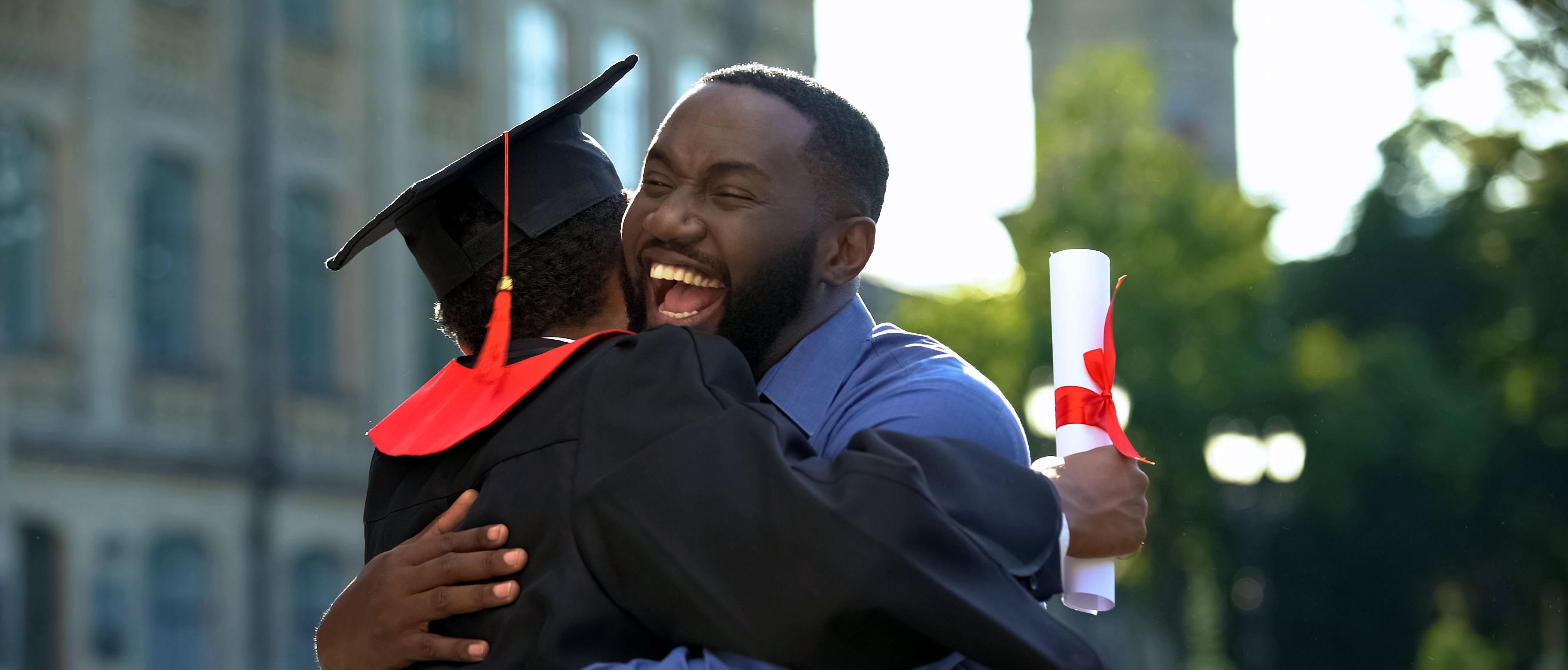 Graduate with happy parent